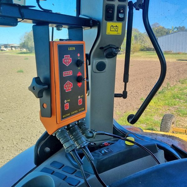 Machine Control Automation Single receiver control unit MCR900 in tractor cab Earthmoving Automation System