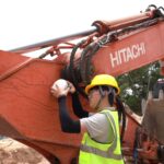 Fitting the EG10 GNSS receiver to a Hitachi excavator stick